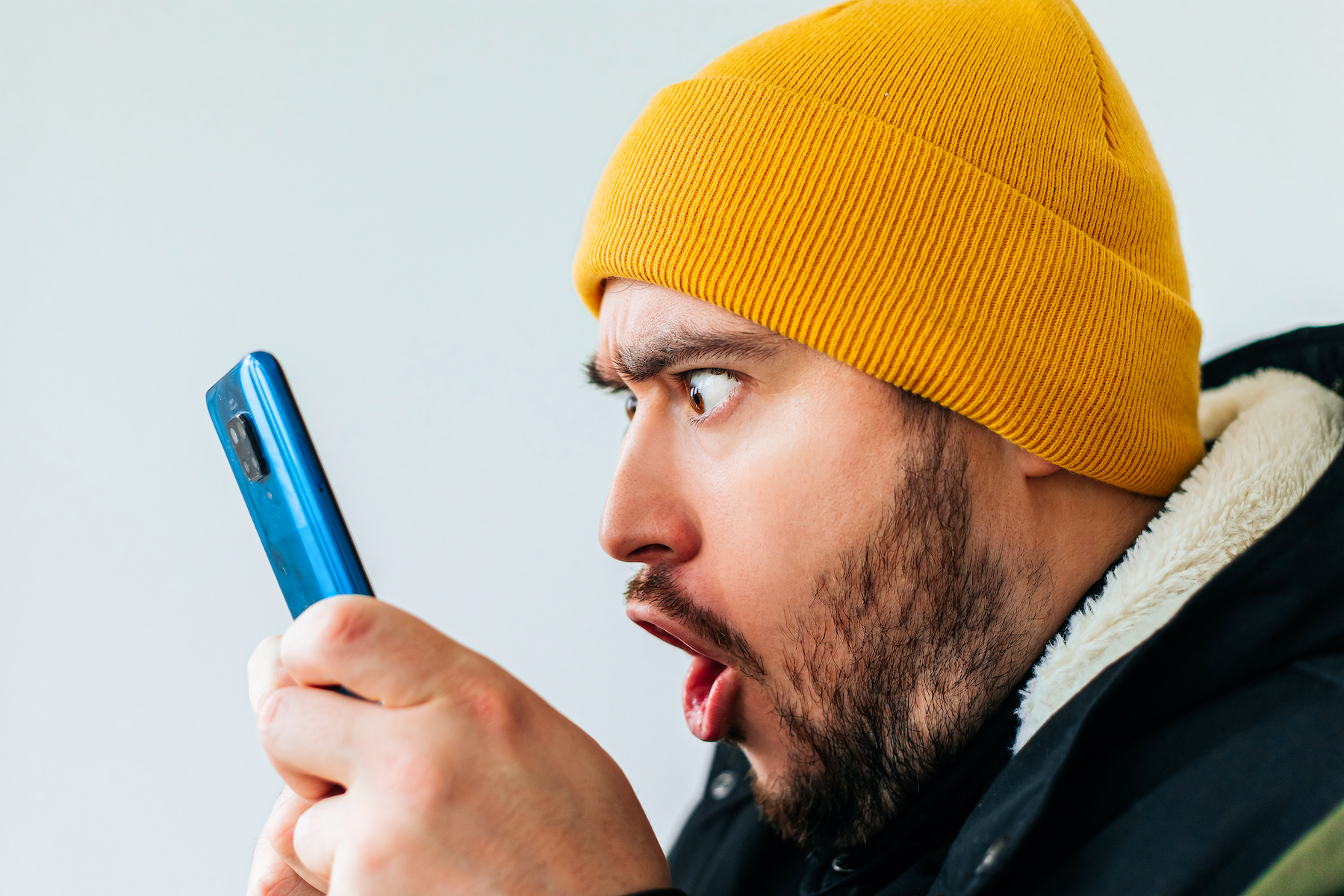 Mad credit union member on smart phone when banking is down