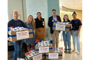 First Harvest team members deliver snack bags to eight local healthcare facilities.