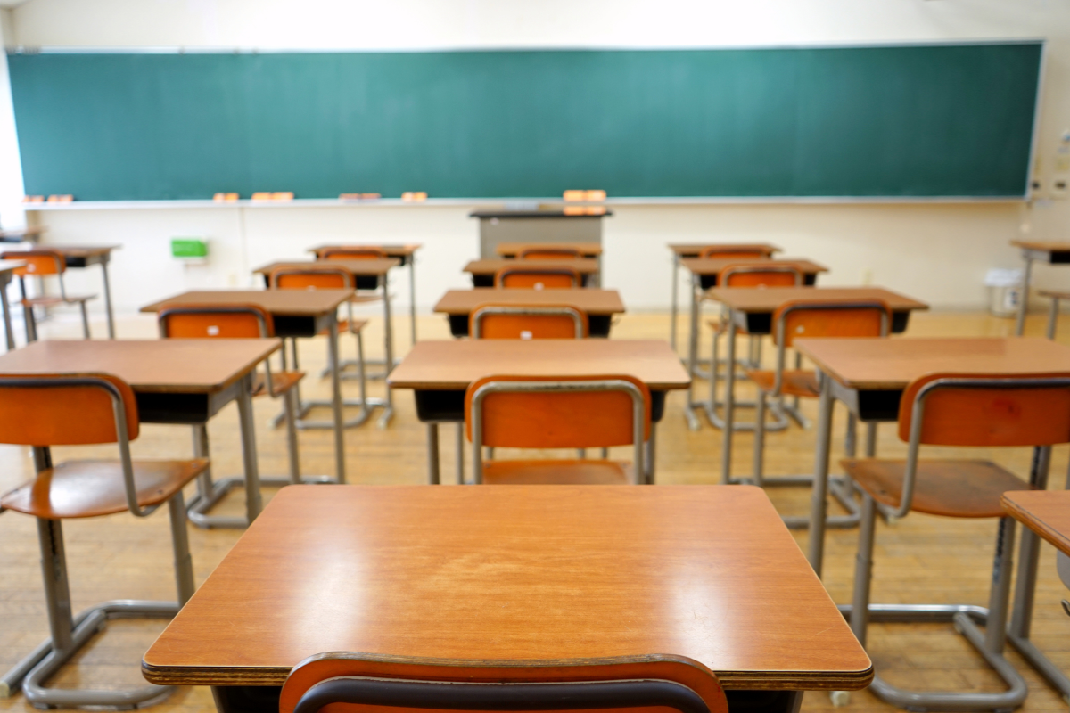 Empty classroom filled with desks