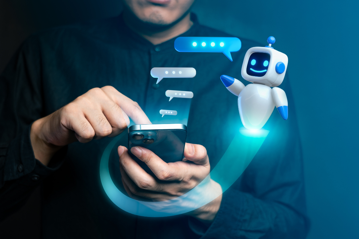 Person using a smartphone to interact with a friendly AI chatbot, illustrating modern technology and digital communication.
