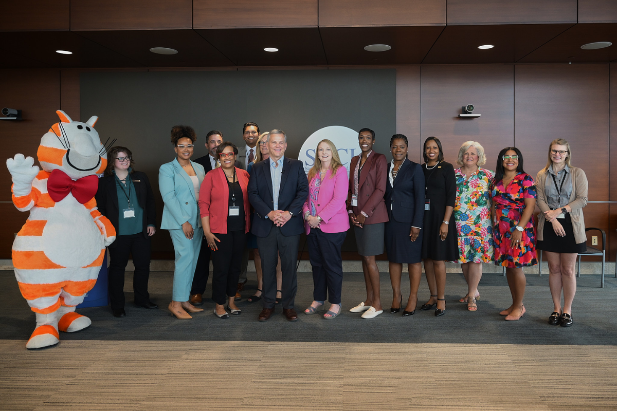 SECU representatives and youth mascot FAT CAT® join Governor Josh Stein for the 2025 Governor’s School Supply Drive kickoff event.
