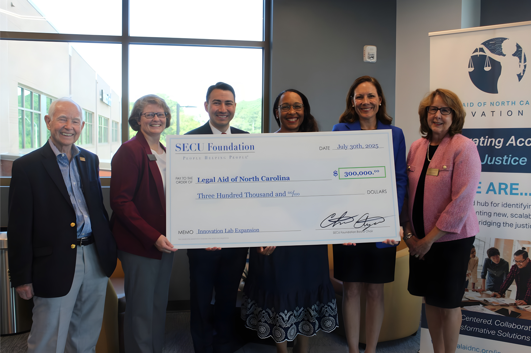 Left to right: SECU Foundation Board member Chuck Stone, SECU Foundation Board Vice Chair Mona Moon, LANC Innovation Lab Advisory Board Chair Jeff Kelly, LANC Chief Innovation Officer Scheree Gilchrist, LANC CEO Ashley Campbell, and SECU President and CEO Leigh Brady.
