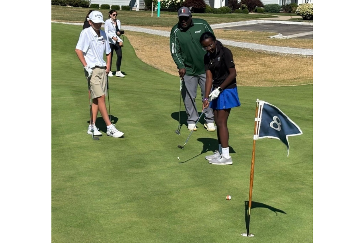 First Tee students and coaches participate in the opening of the Wee Course.