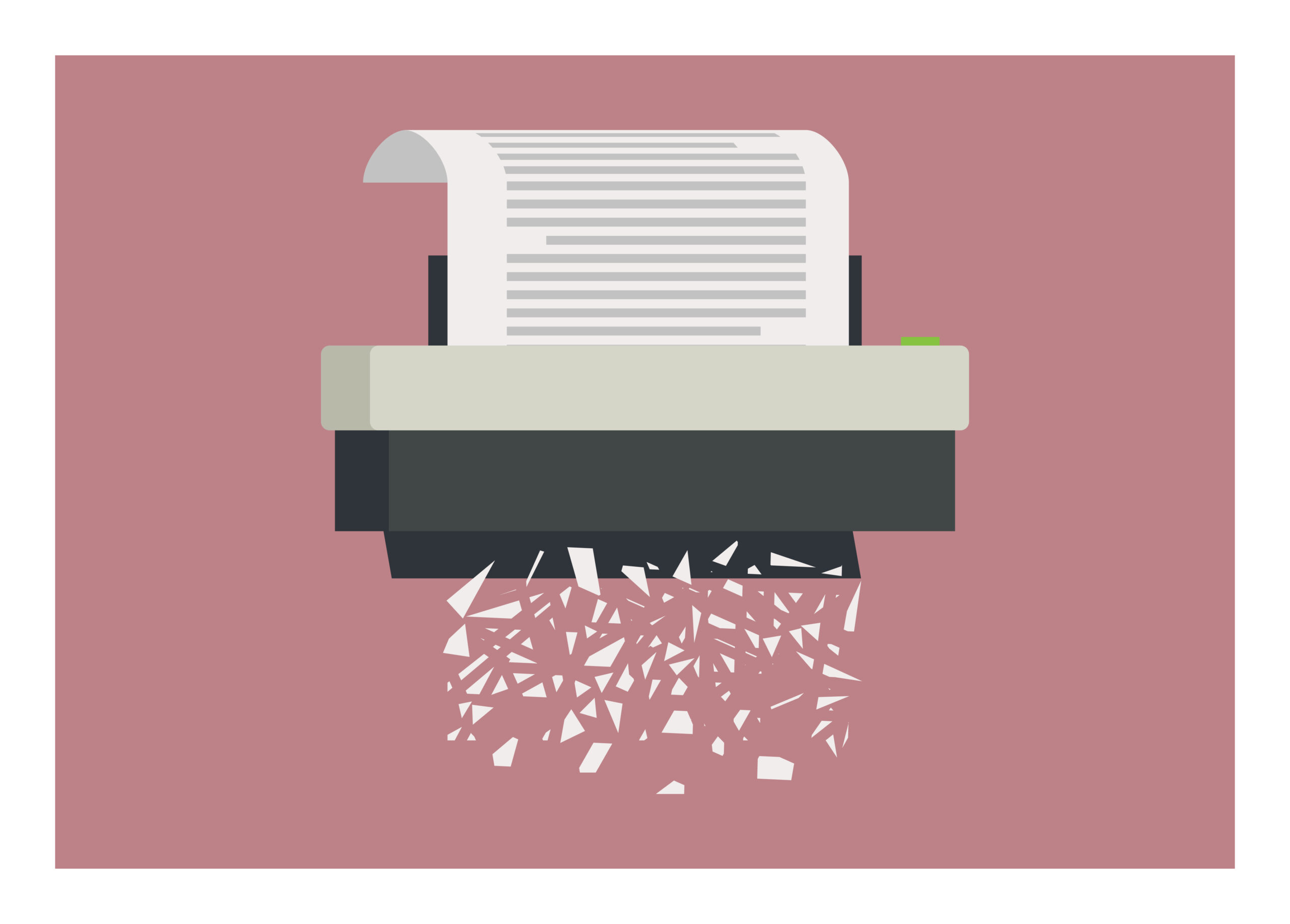 Paper shredder shredding a piece of paper