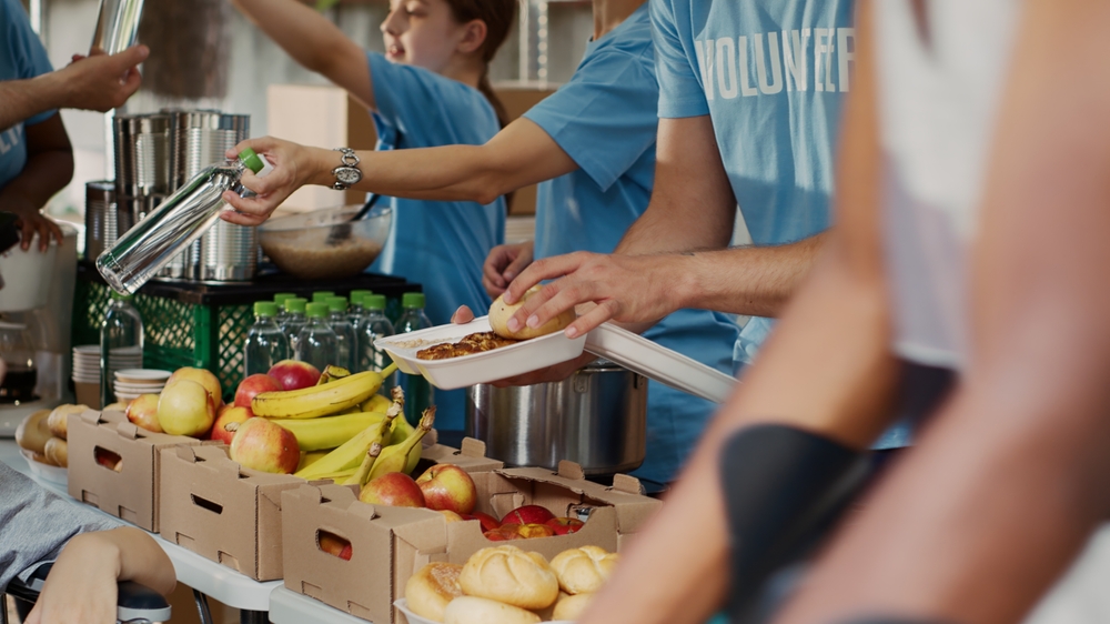 Volunteers distributing food at food drive