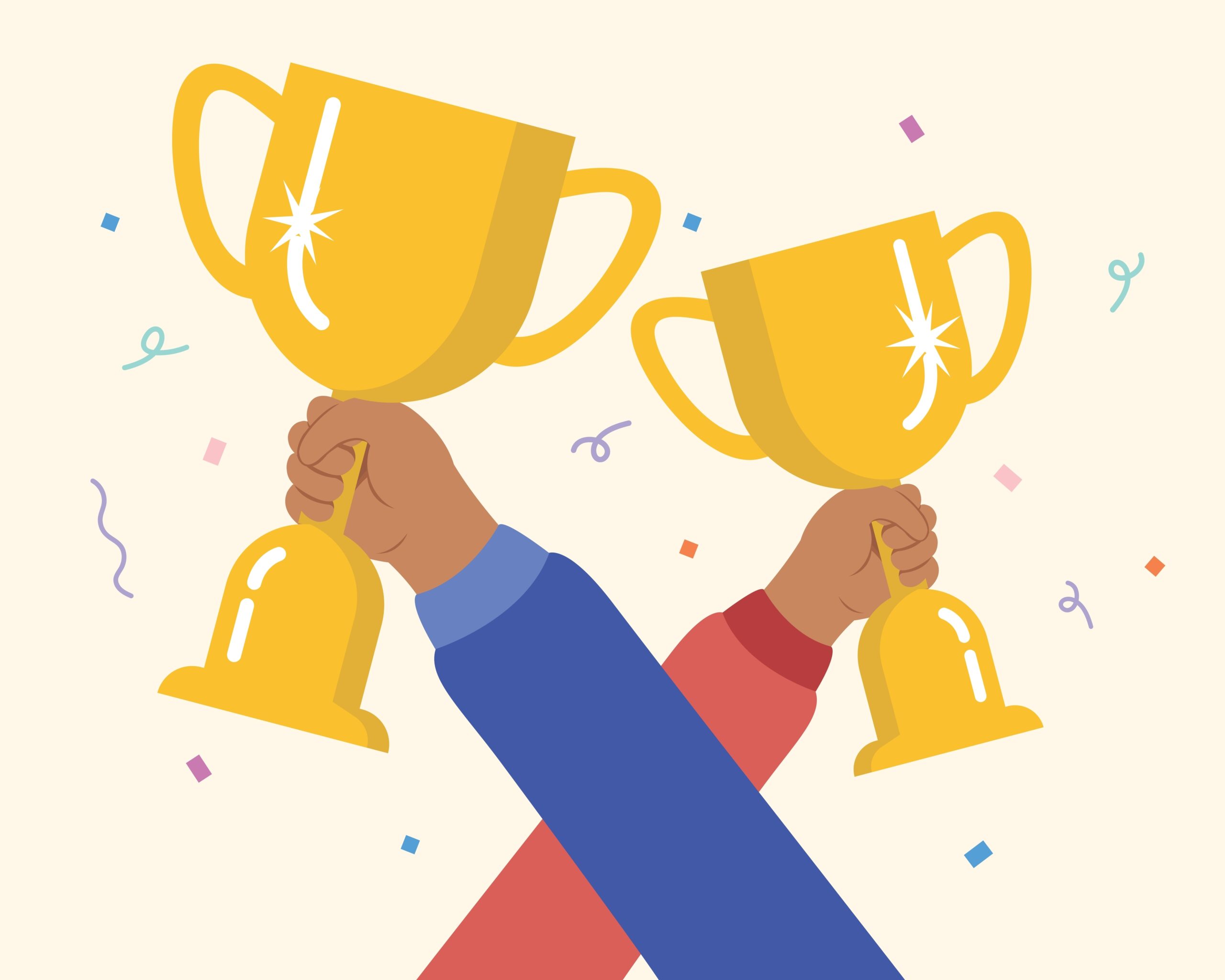 Two people holding up gold trophies