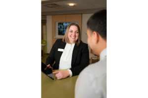 Redwood CU- Redwood employee having discussion with member photo