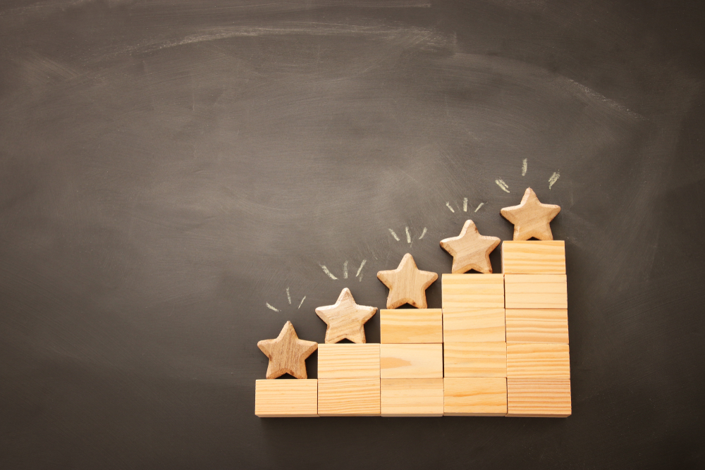 Stairs made of wooden blocks; wooden stars on top of stairs