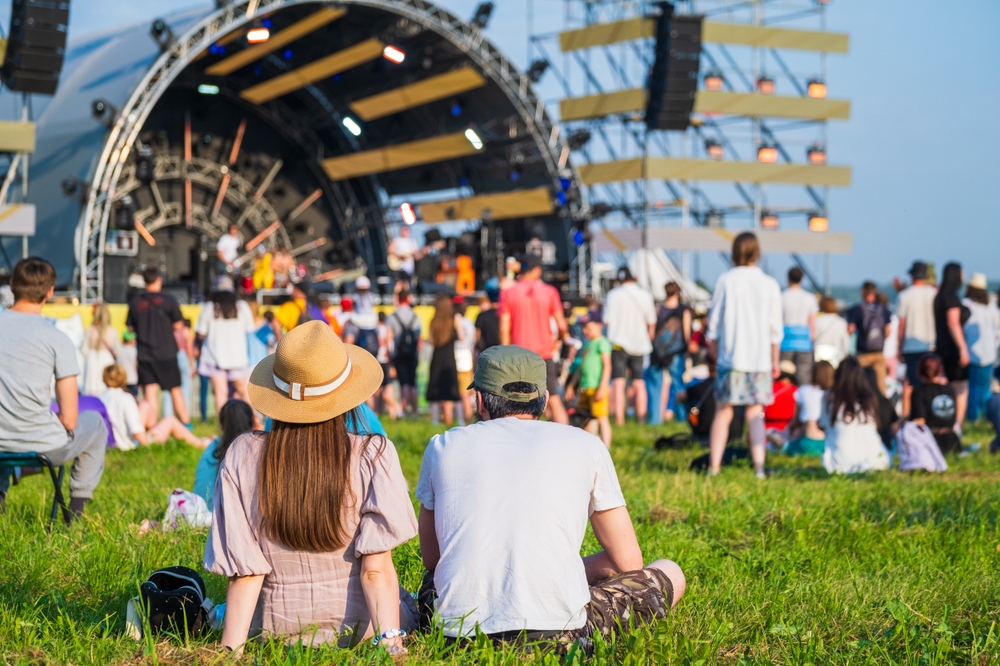 Crowed gathered in front of concert stage