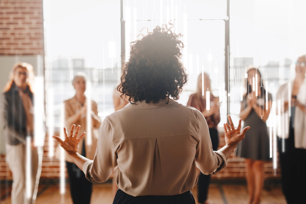 Businesswoman leading team of coworkers