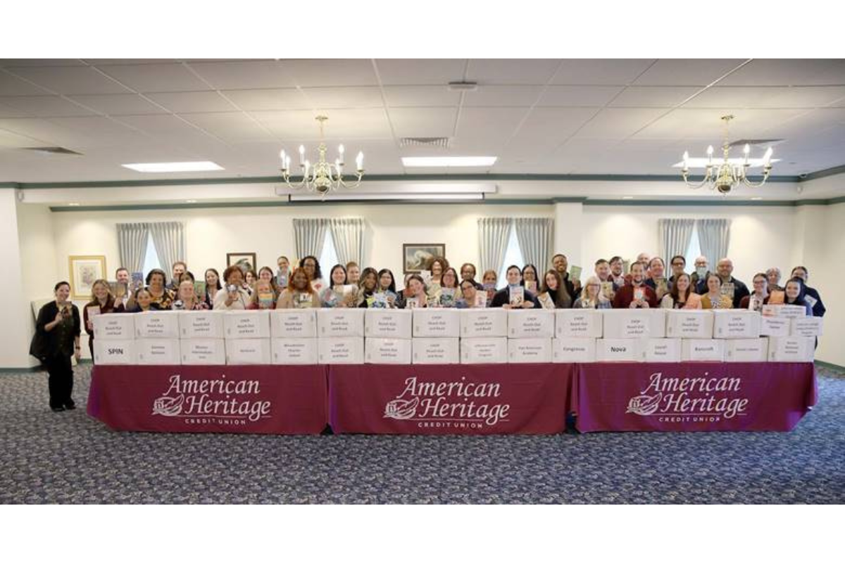 American Heritage Credit Union- Book donation group photo