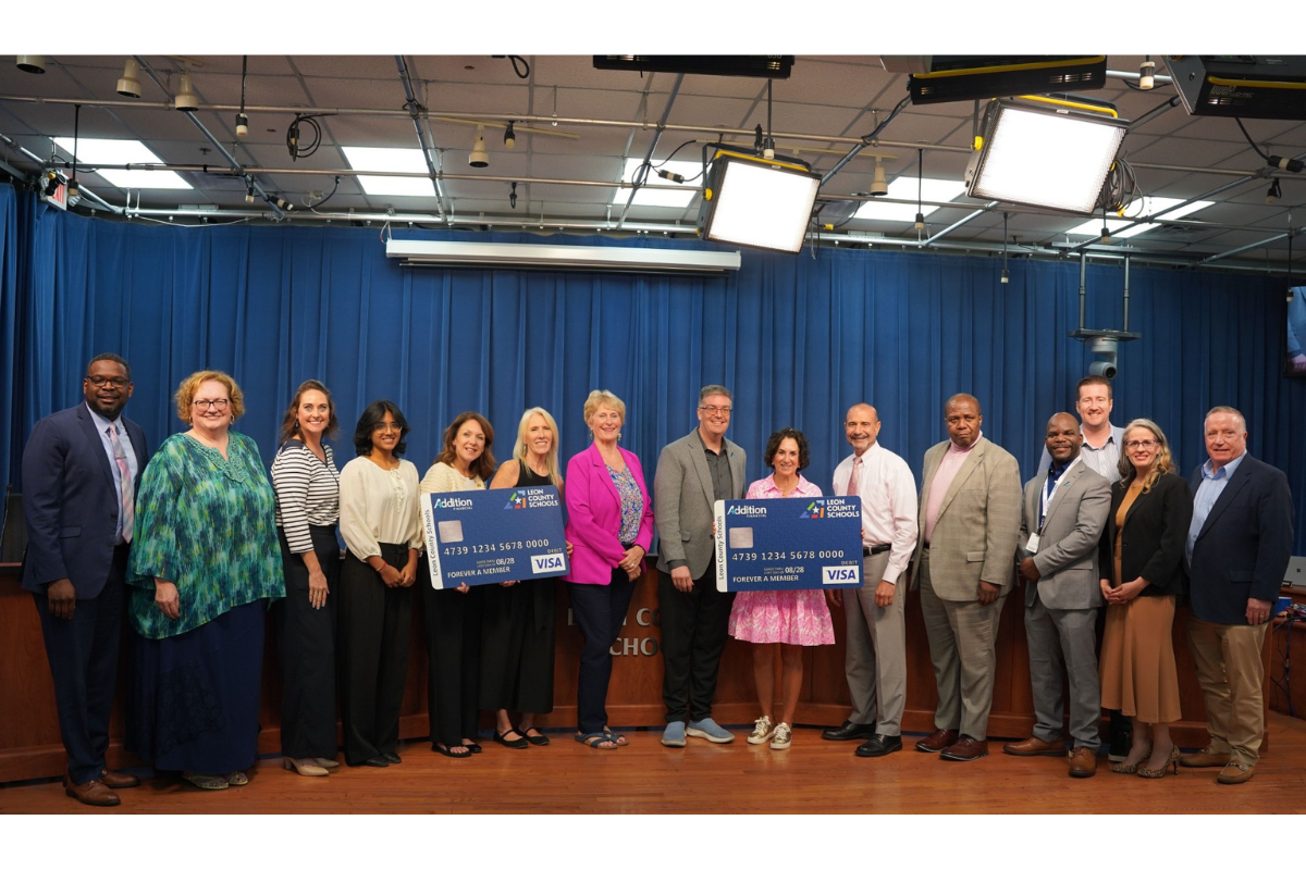 Addition Financial Credit Union- Leon County Schools check presentation group photo