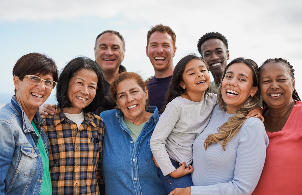Group of smiling multigenerational people
