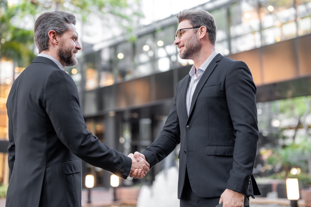 Two businessmen shaking hands
