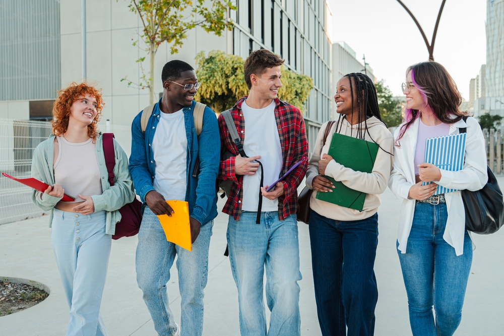 Group of college students walking together