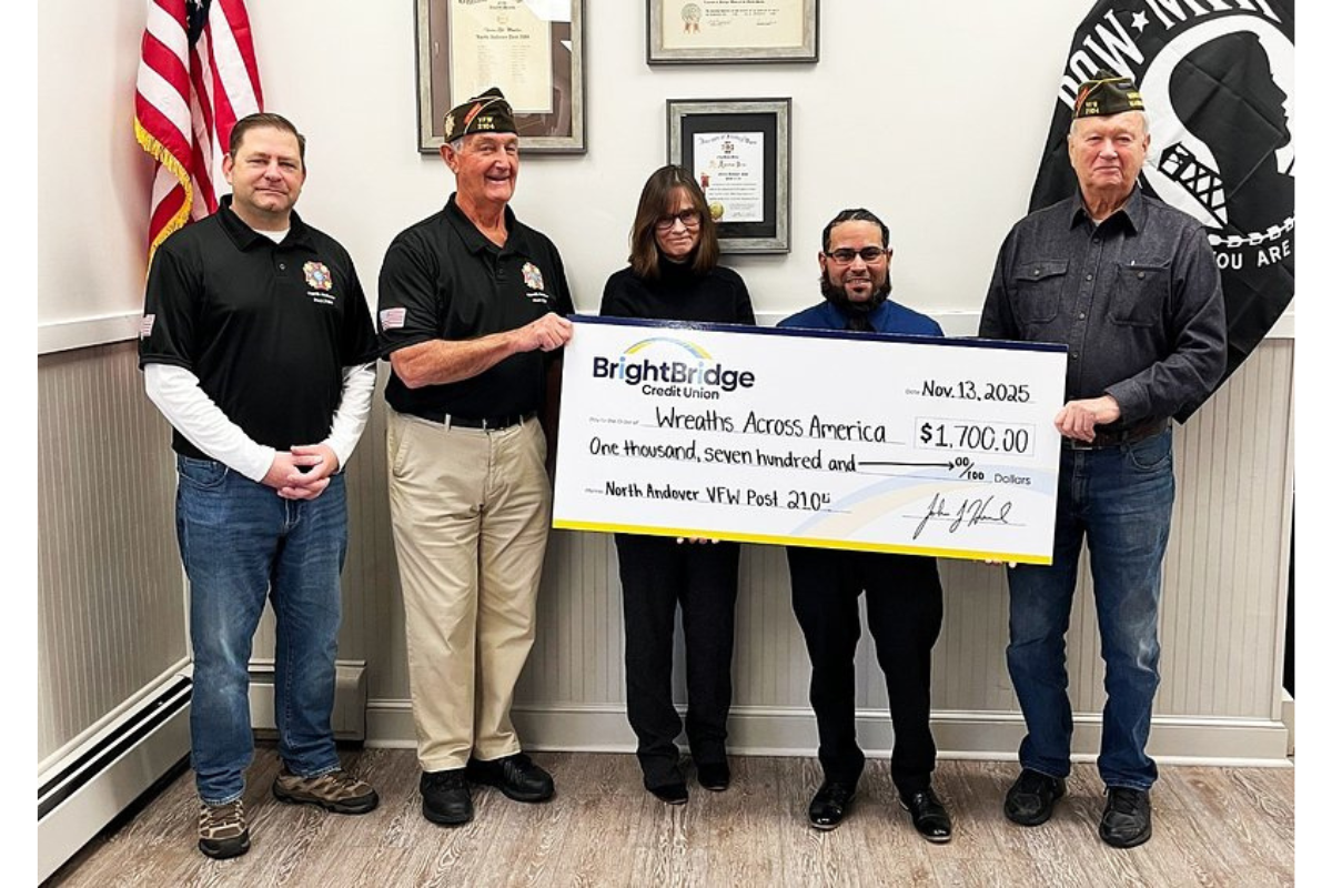VFW members David Hruban and Bill Dolan, BrightBridge Vice President of Marketing Paula Kerwin, Miguel Rodriguez and VFW Board of Directors member John Thompson.