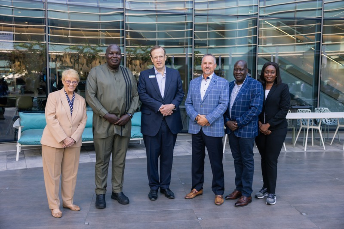 photo of L-R: Lois Kitsch, Chair of African Cooperative Development Foundation; George Ambado, Executive Director of ACCOSCA; Bill Cheney, CEO, SchoolsFirst FCU; Brett Martinez, CEO, Redwood CU; David Sohelo Mategwa, Chairperson of Kenya National Police DT SACCO; Grace Watsiera, Executive Director of African Cooperative Development Foundation