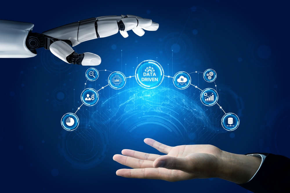 Human and robot hand around data bubbles; "data-driven" in center bubble