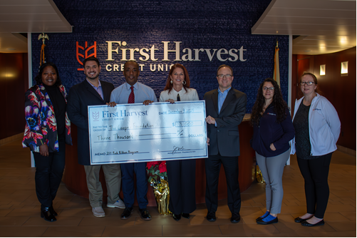 First Harvest’s Charitable Journey Committee and leaders present the Cooper Foundation with funds raised from First Harvest’s 2025 Pink Ribbon Program.