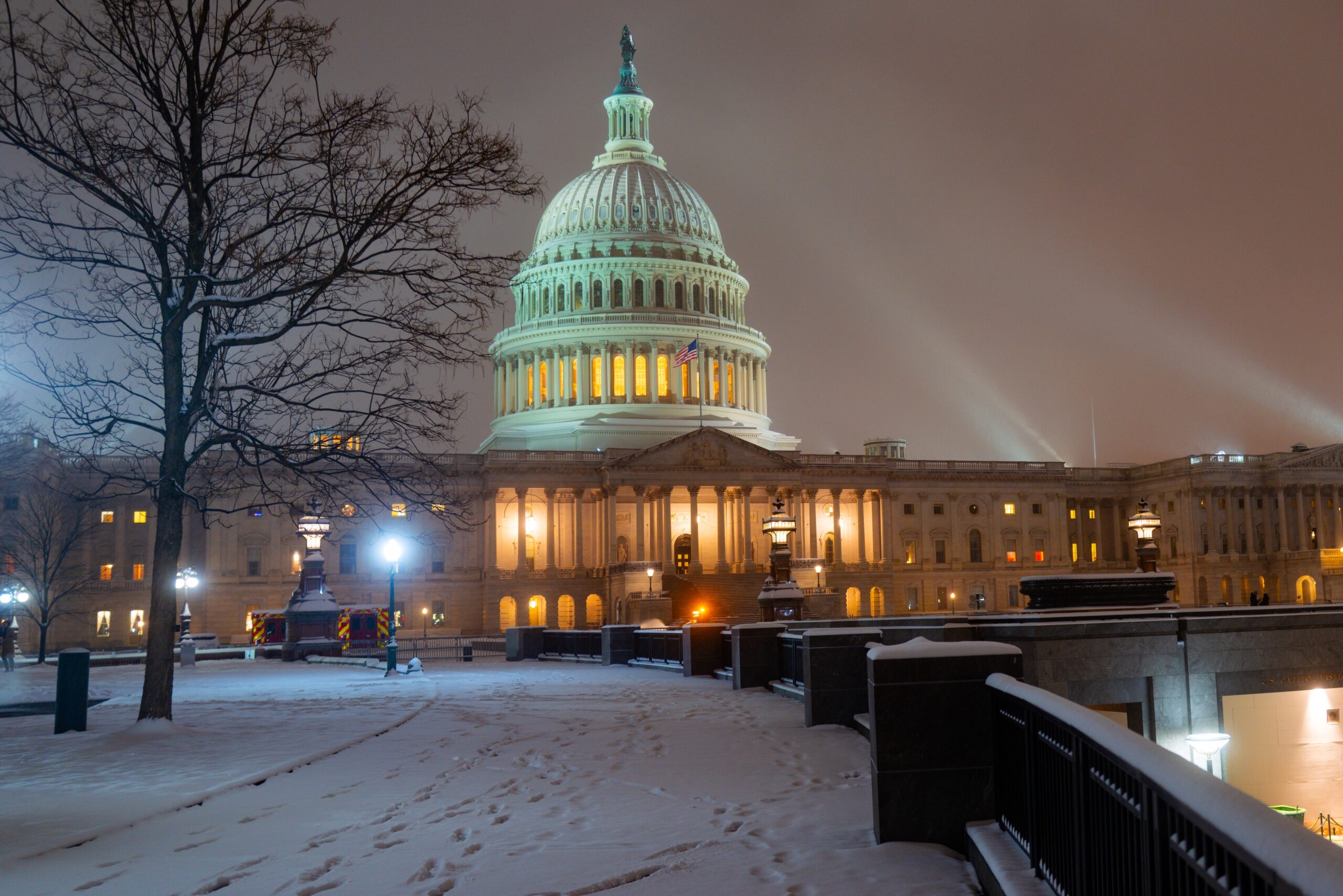 Washington DC in night winter snow. Capitol Building in night. Washington city Capitol. United States Capital. USA landmark. Supreme Court. Washington D.C. Night Washington city.