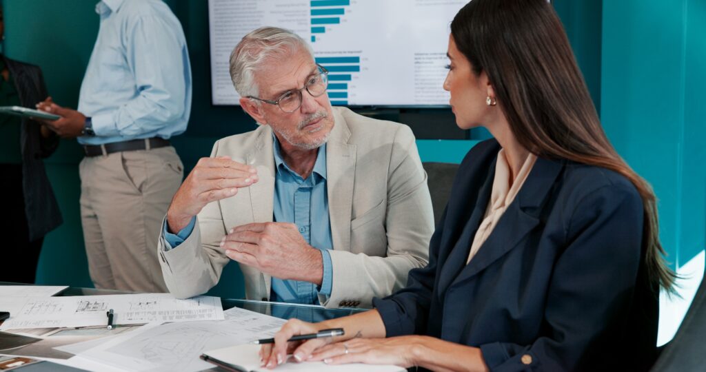 Floor plan, graphs or business people in meeting for architecture project, charts or teamwork. Paperwork, talk or architects in discussion with feedback report for blueprint, engineering or documents