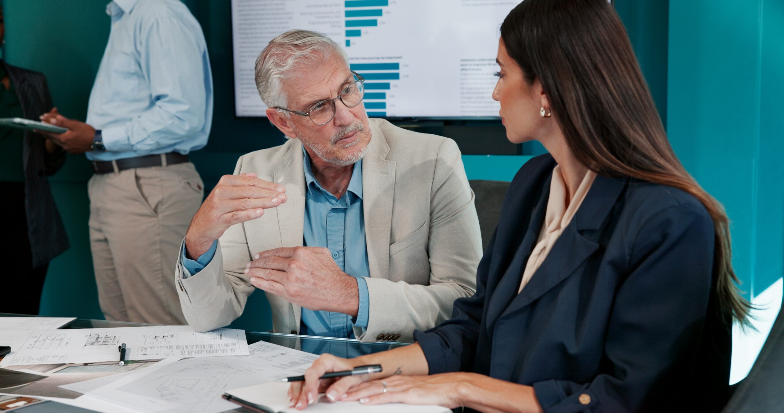 Floor plan, graphs or business people in meeting for architecture project, charts or teamwork. Paperwork, talk or architects in discussion with feedback report for blueprint, engineering or documents