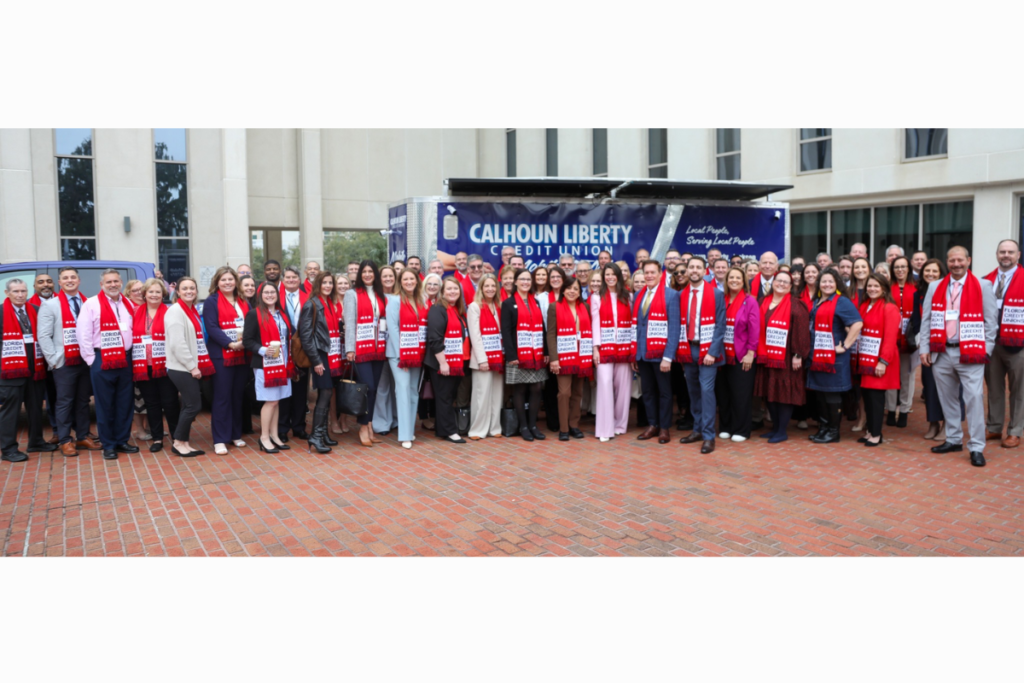 Credit unions from across Florida gathered in Tallahassee with about 109 attendees pictured together posing for picture
