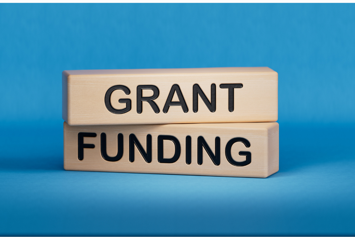 Grant funding symbol. Wooden blocks with words Grant funding.Business and Grant funding concept. Copy space.3D rendering on blue background.