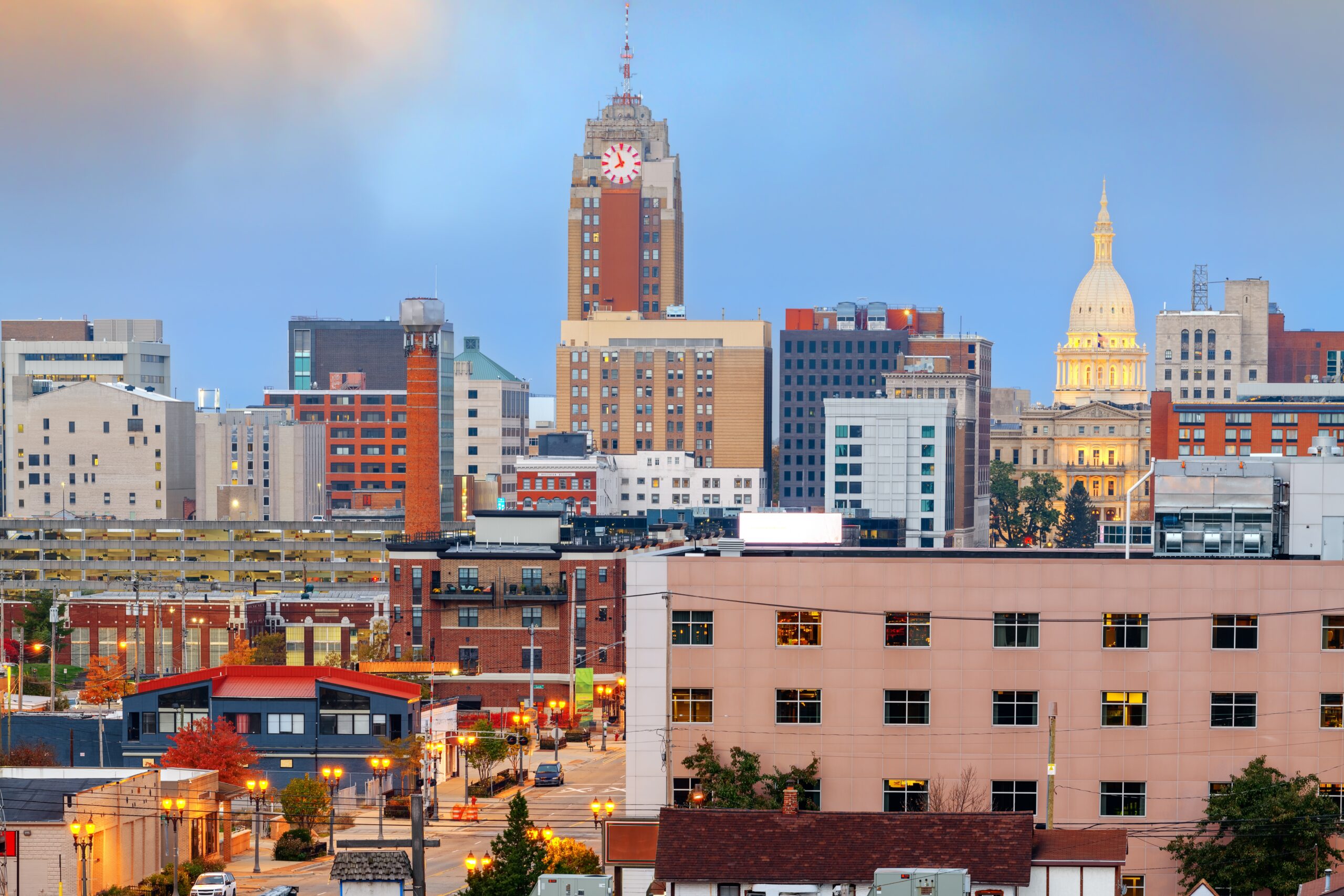 Lansing, Michigan, USA downtown city skyline at twilight.