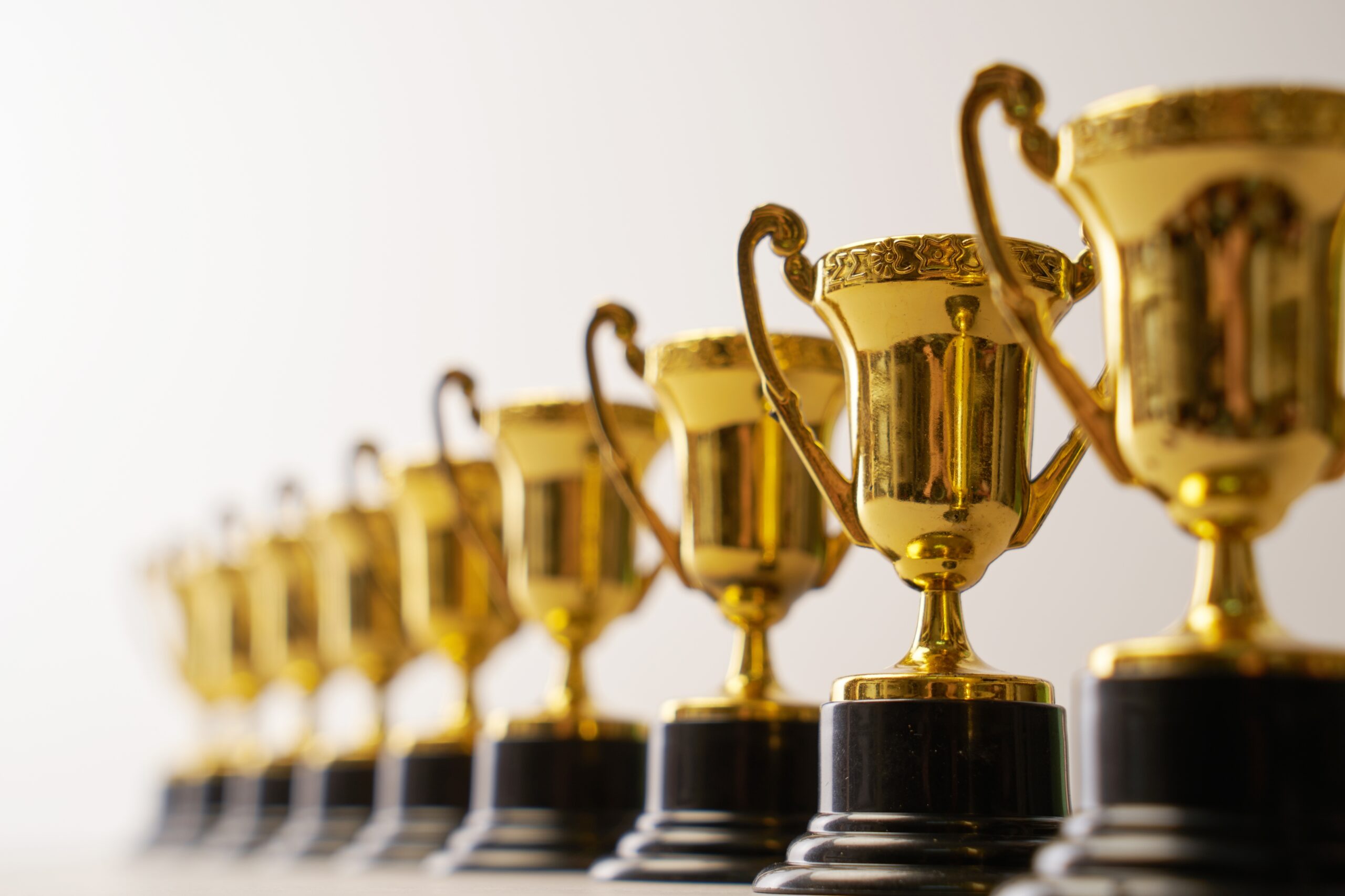 group of trophies in a row