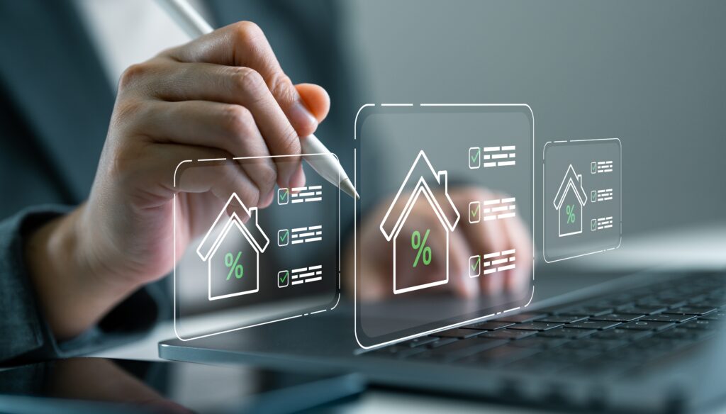 Businessperson using digital to manage housing loan interest rates. Mortgage calculation, real estate finance, online loan application and financial technology concept. Paperless lending system.