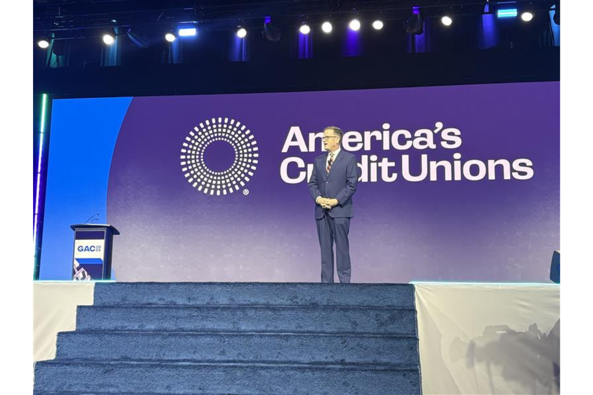 Photo of Scott Simpson on stage at the Governmental Affairs Conference