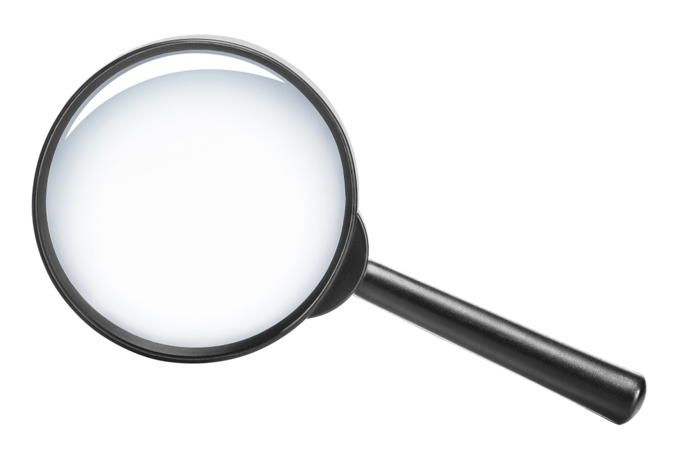 Magnifying glass on white background