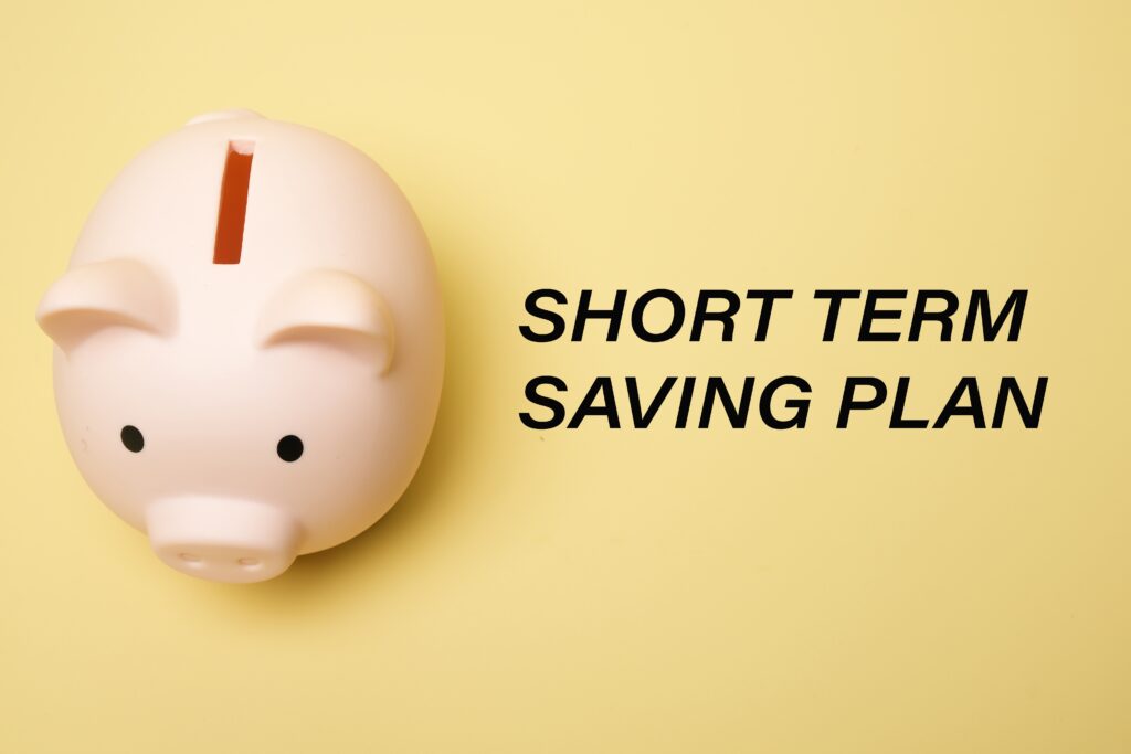 A picture of piggybank with the word short term saving plan. Short term saving plan is money that you save for certain issue and agenda in near time.