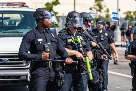 Los Angeles, USA – June 8, 2025: LAPD officers standing guard during a downtown demonstration against expanded ICE operations and in support of immigrant rights.