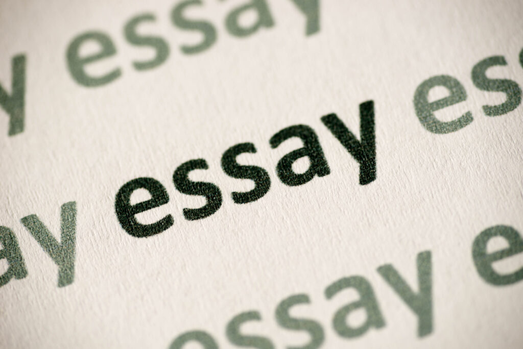 word essay printed on white paper macro