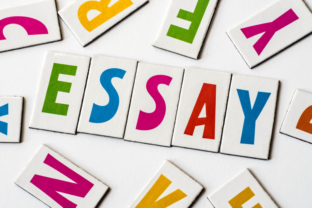 word essay made of colorful letters on white background