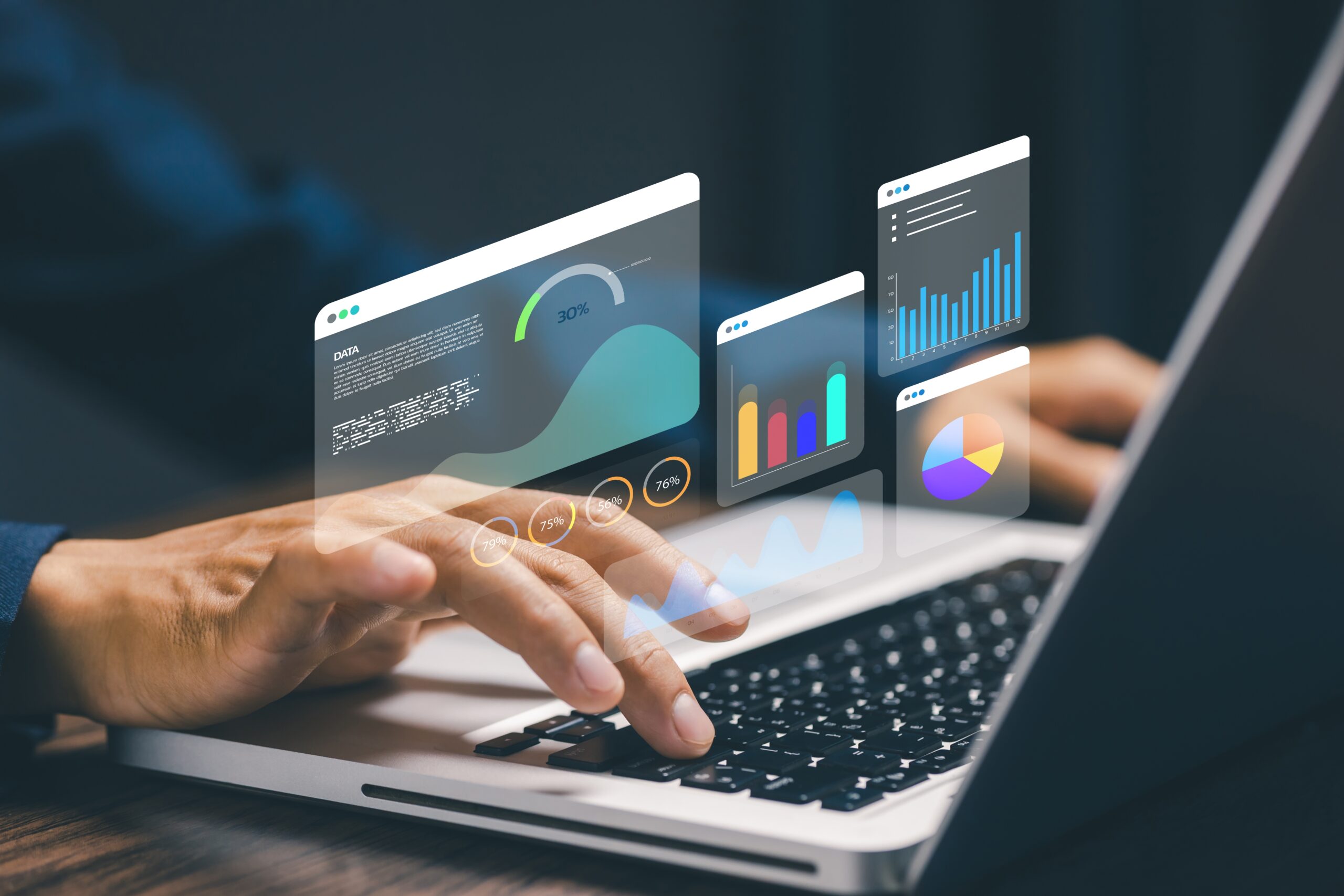 Data analytics dashboard concept with business person using laptop, showing charts, graphs, and performance metrics for business intelligence and data driven decision making.