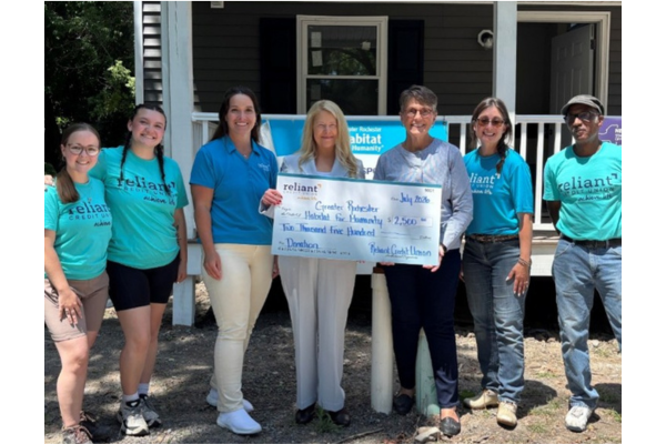 Reliant Credit Union check presentation to Habitat for Humanity