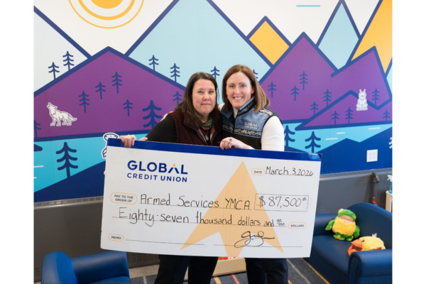 Global Credit Union presents a check to Armed Services YMCA Alaska